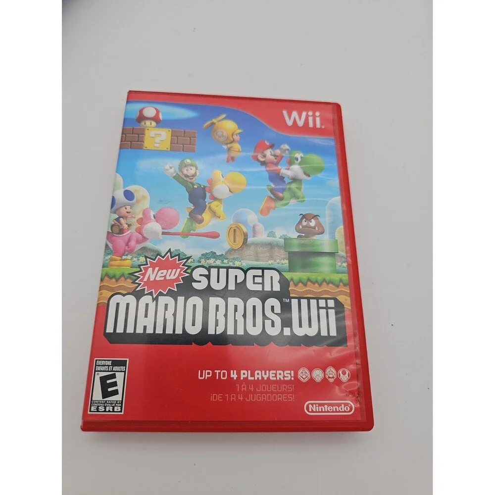 New Super Mario Bros. Wii Nintendo 2009 Complete w Manual Tested Very Good Condi